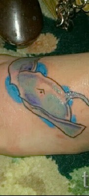 Fényképes példa egy csípős tetoválásról 2342353636