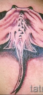 Fényképes példa egy csípős tetoválásra 37