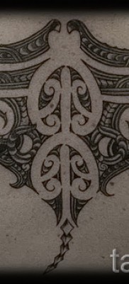 Fényképes példa egy csípős tetoválásról 32