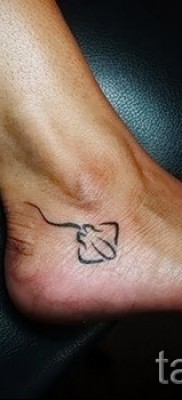 Fényképes példa egy csípős tetoválásról 15