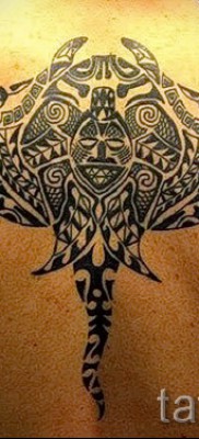 Fényképes példa egy csípős tetoválásra 14