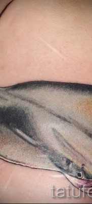 Fényképes példa egy csípős tetoválásra 33