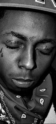 fotó egy könnycsepp tetoválásról az arcon, 2018.04.16., 009 - tetoválás szakadás az arcán -