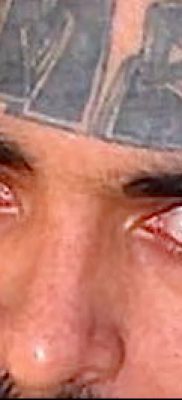 fotó egy könnycsepp tetoválásról az arcon, 2018.04.16. №052 - tetoválás szakadás az arcán -