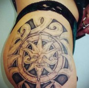 nap tetoválás combon + maori népi minták