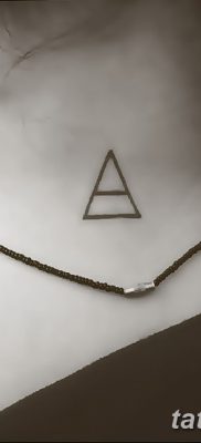 foto af en triadetatovering dateret 27.08.2017 №011 - triadetatovering -