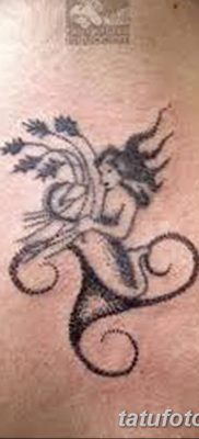 fotó a triskelion tetoválásról, 2018.01.09. №050 - triskelion tetoválás -