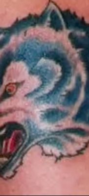Снимка на татуировка с вълк и пера от 21.09.2018 г. №036 - татуировка вълк и перо -