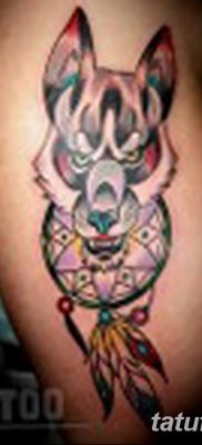 Снимка на татуировка с вълк и пера от 21.09.2018 г. №070 - татуировка вълк и перо -