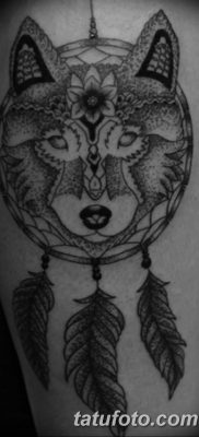 Снимка на татуировка вълк и перо от 21.09.2018 №063 - татуировка вълк и перо -