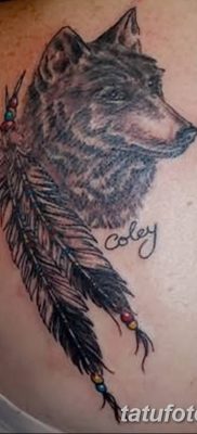 Снимка на татуировка с вълк и пера от 21.09.2018 г. №015 - татуировка вълк и перо -