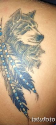 Снимка на татуировка с вълк и пера от 21.09.2018 г. №021 - татуировка вълк и перо -