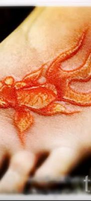 Fotó egy aranyhal tetoválásról a tetoválás tervezéséről szóló cikkhez - tatufoto.ru - 1