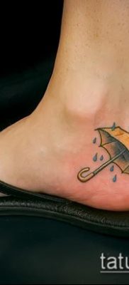 fotó egy esernyő tetoválásról (jelentése) - példa egy érdekes tetoválási rajzra - 009