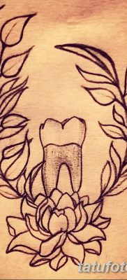 fotó egy fogtetoválásról, kelte: 09.09.2017 №008 - tetovált fog -