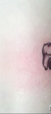 fotó egy fogtetoválásról, kelte: 2017.09.13. №020 - tetovált fog -