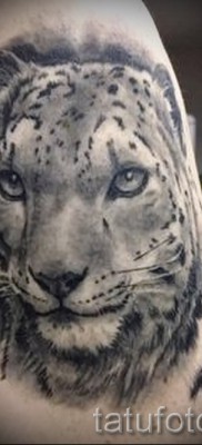 Fotó egy leopárd tetoválásról - eredeti munka a karon