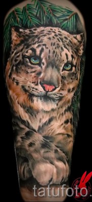 Fotó egy leopárd tetoválásról - egy gyönyörű munka a karon