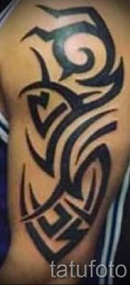 صور - Tatouage tribal sur son bras - un exemple pour un article sur l'importance de 1021 tatufoto.ru