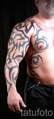 Foto - Tribal Tattoo auf seinem Arm - ein Beispiel für einen Artikel über die Bedeutung der 1009 tatufoto.ru