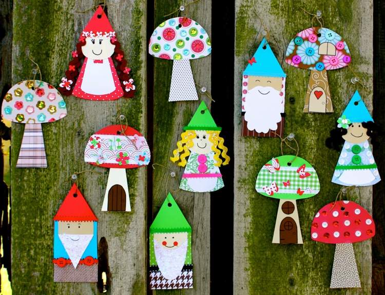 Trpaslíci drotári s farebným papierom s deťmi